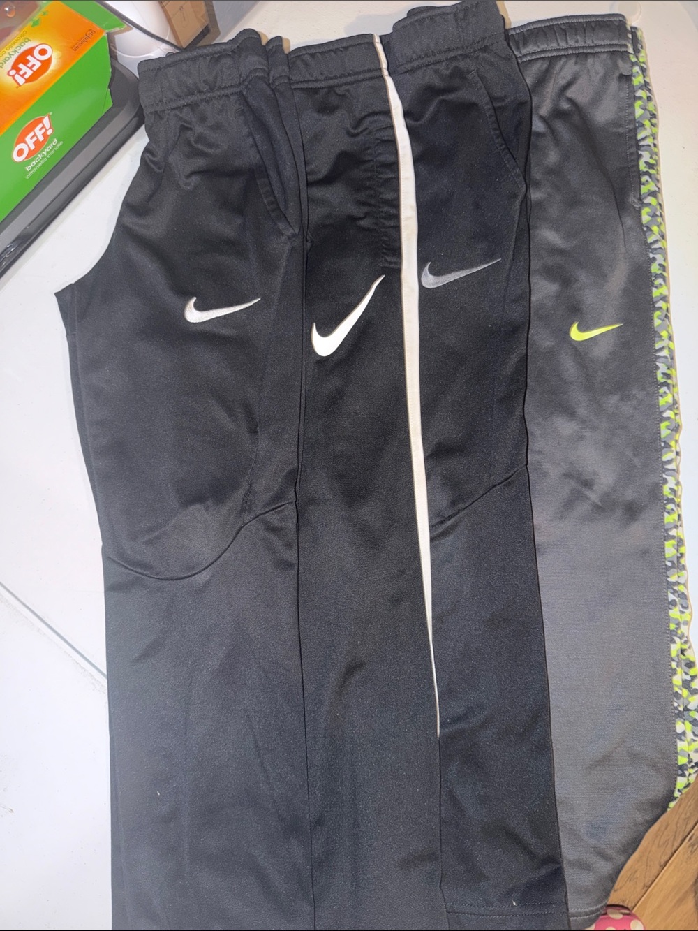 Nike Kids Black Track Pants Trio with White and Neon Swooshes
